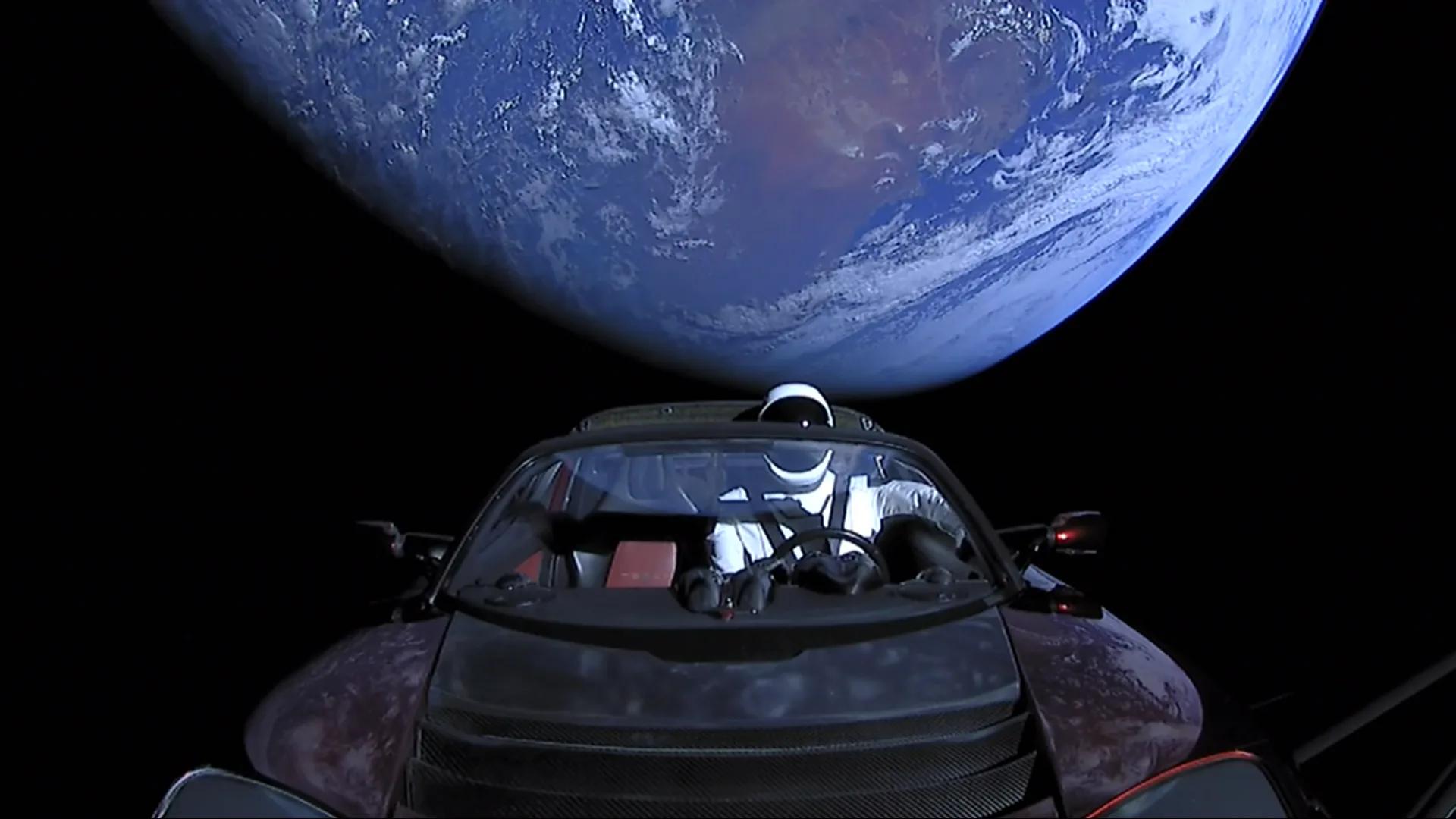 SpaceX's Starman, drifting in a Tesla Roadster