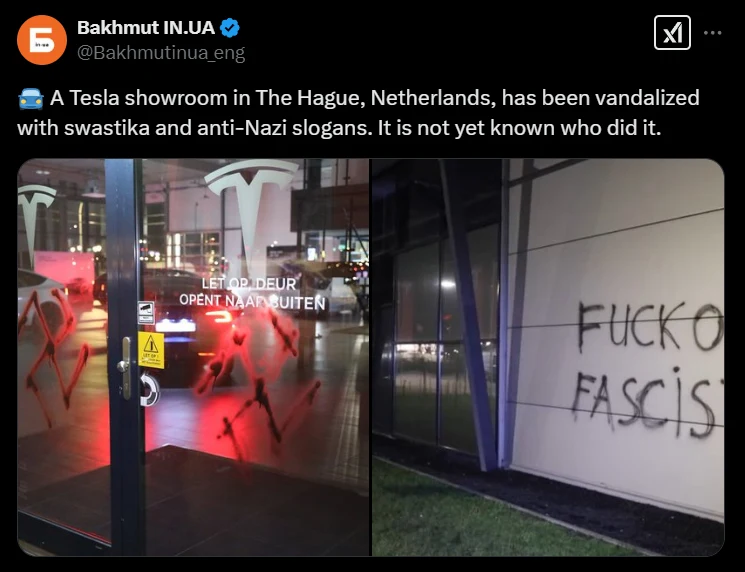 A Tesla showroom in The Hague, Netherlands, has been vandalized with swastika and anti-Nazi slogans