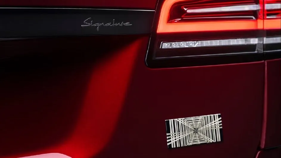 Signature liftgate applique and a gold plaid badge. 